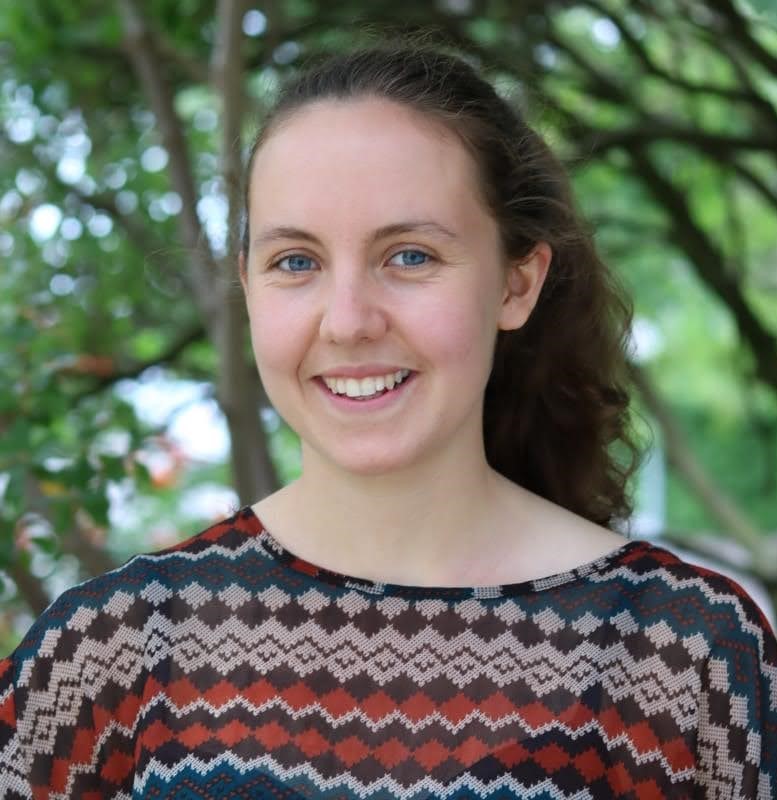 Image of Fiona stood in front of a tree