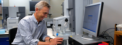 Man in lab at computer