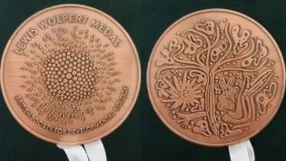The Wolpert Medal's design includes various different model organisms