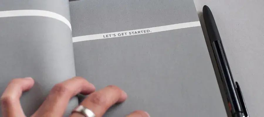 Document that reads "lets get started"
