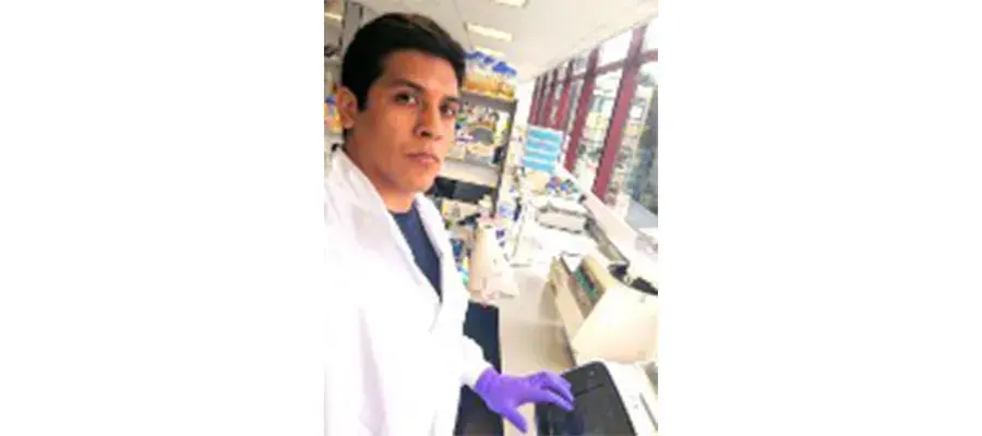 Dr Felipe Millacura in a lab.