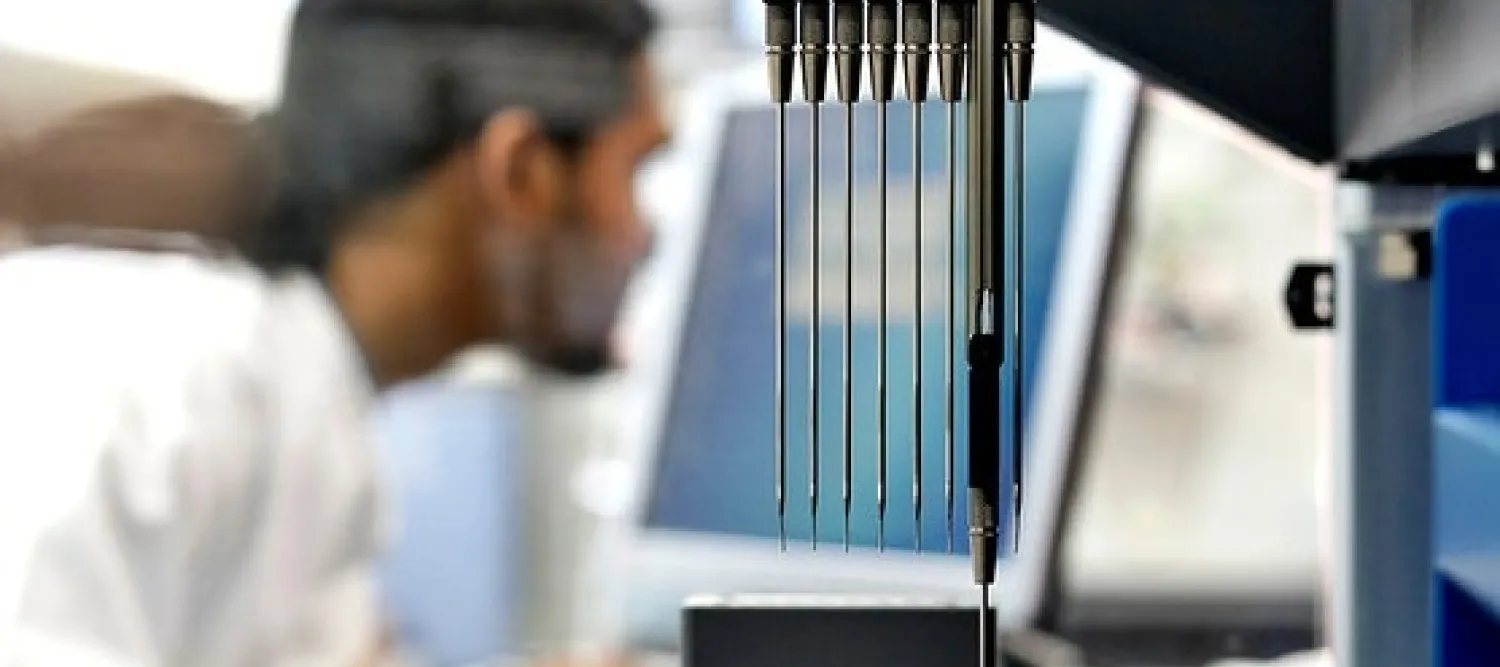 Male student working in a lab.