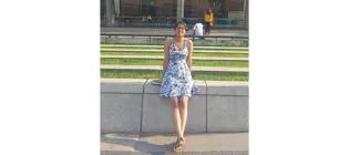 Jovanna Maharaj standing in a dress outside.