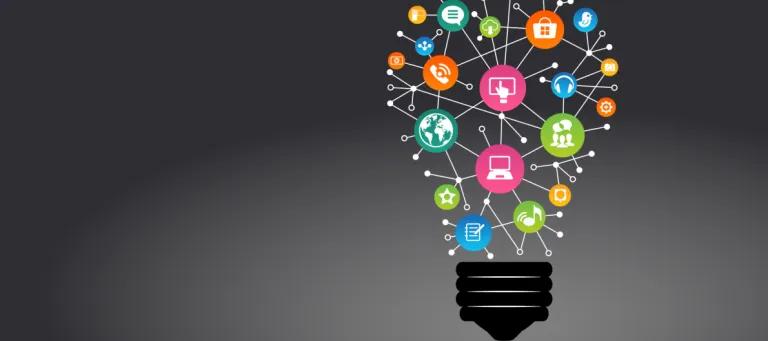 Lightbulb made from web of industry icons
