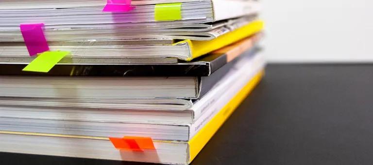 Folders sit on a desk