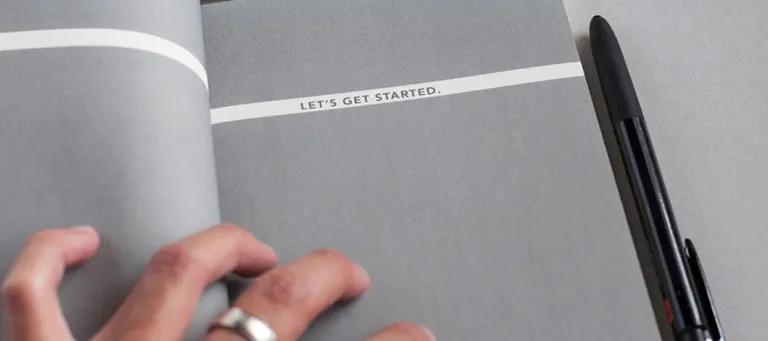 Document that reads "lets get started"