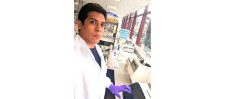Dr Felipe Millacura in a lab.