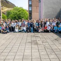 Image of large group of symposium attendees