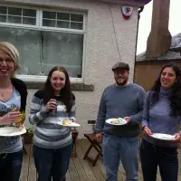 Photo of the lab group sitting with drinks 