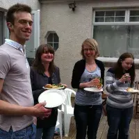 Photo of the lab group sitting with drinks 