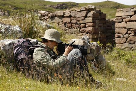 Josephine Pemberton undertaking fieldwork on the island of Rum - Image Credit: Murdo MacLeod, The Guardian