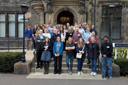 group picture of Hub members gathering outside a Hall
