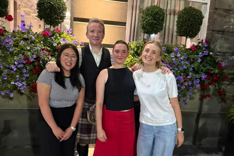 A group of people posing for a photo
