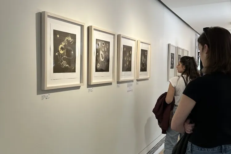 Students looking at artwork