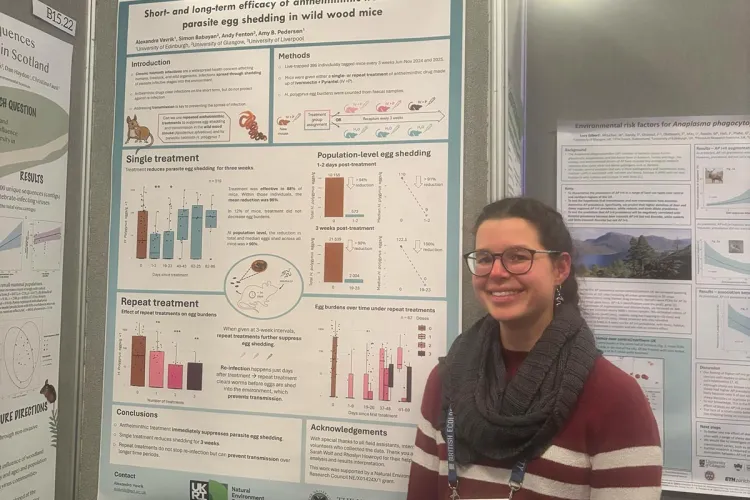 Photo of Alex presenting a poster at the British Ecological Society annual meeting in Edinburgh.