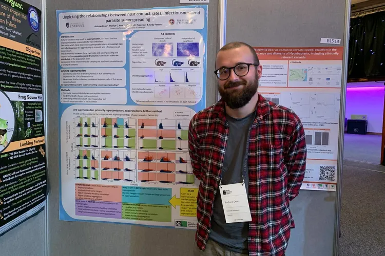 Photo of Andy and presenting a poster at the British Ecological Society annual meeting in Edinburgh.