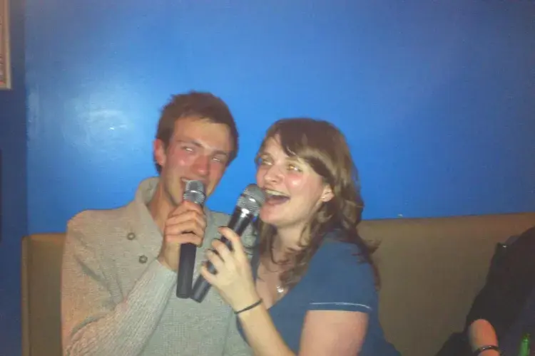 Photo of the lab group sitting with drinks 