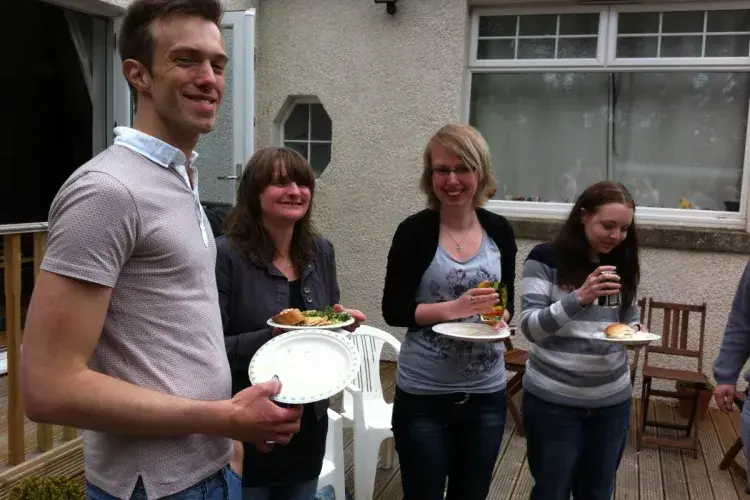 Photo of the lab group sitting with drinks 