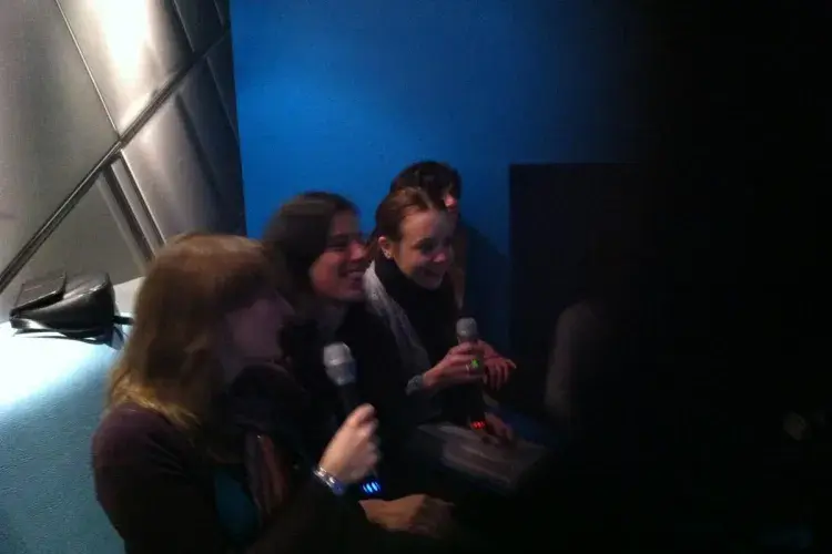 Photo of the lab group sitting with drinks 