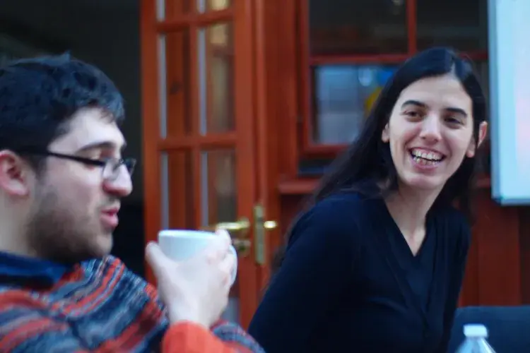 Photo of two lab group members sharing a laugh