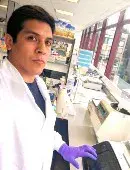 Dr(c) Felipe A. Millacura in the lab.