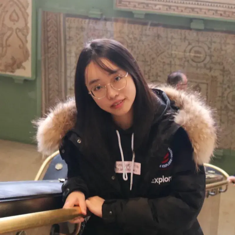 Headshot of Lu Zhang in a museum