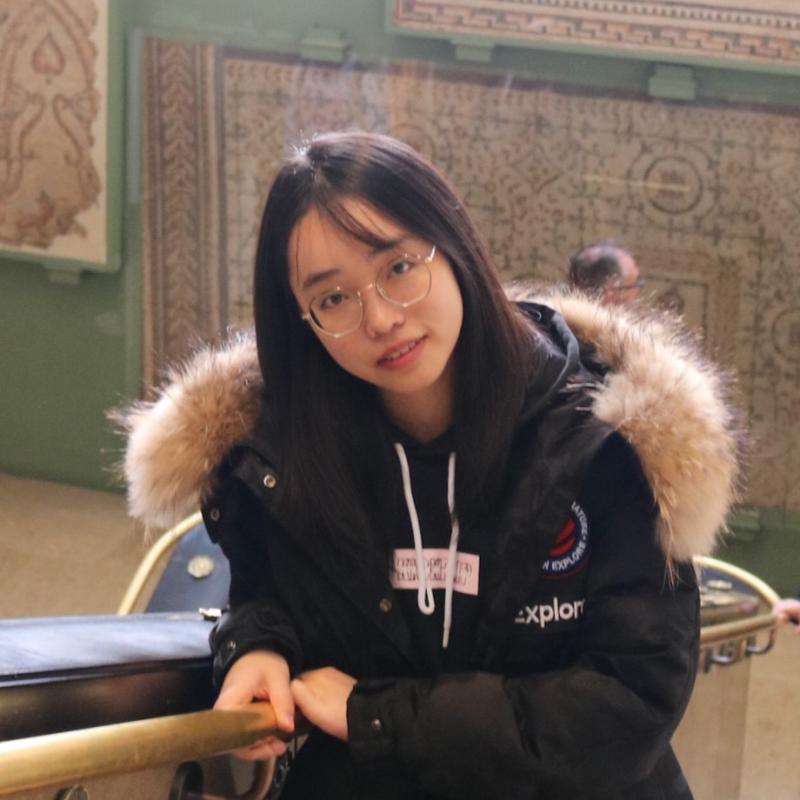 Headshot of Lu Zhang in a museum