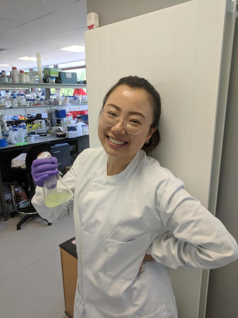 Nuoya Chen in the lab, smiling.