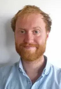 Headshot of Luke McNally.