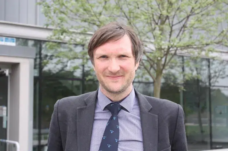 Tom McNeilly.