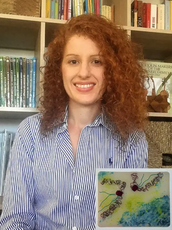 Constandina with her tile artwork "Sibling rivalry".