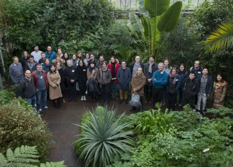 Laura Forrest, Justin Goodrich and Erica de Leauand international researchers pose for photo at the Royal Botanical gardens