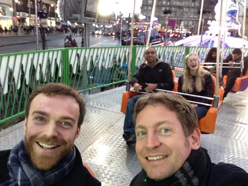 Gerben and a ab group member on a fairground ride