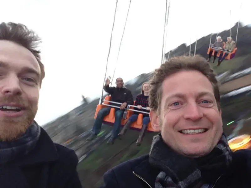 Gerben and a lab group member on a fairground ride