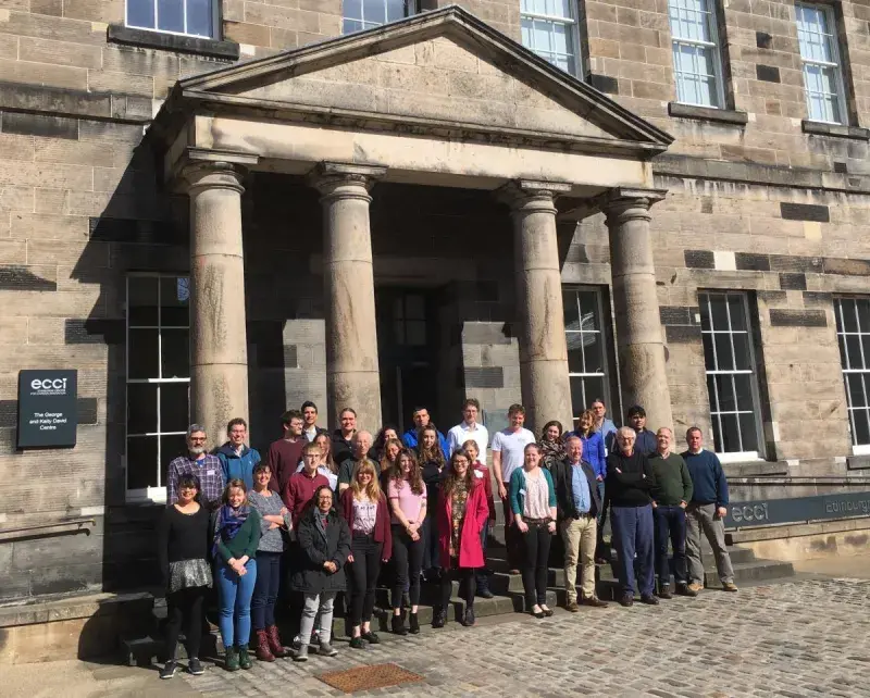 Photo of the Plant Clock research workshop participants in a group outside a building