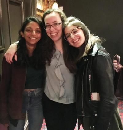 Three lab group members pose for a photo