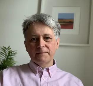 Headshot of Professor Keith Matthews.