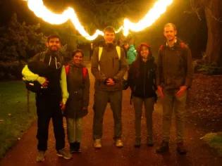 Photo of group outdoors in front of strings of lights, with: Mario Duran, Surabhi Ranavat, Max Brown, Camila Penafiel, Alex Twyford