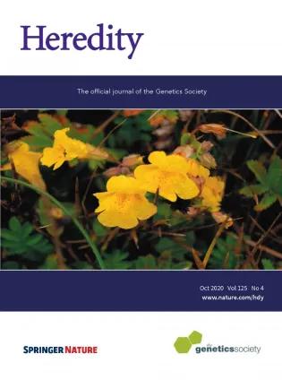 Cover of Heredity, journal of the Genetic Society, from October 2020, featuring a photo of a yellow flowered Erythranthe peregrina plant