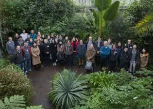 Laura Forrest, Justin Goodrich and Erica de Leauand international researchers pose for photo at the Royal Botanical gardens