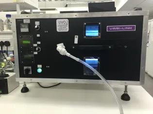 Photo of the Vari-X-linker UV cross-linker machine with cables, lights and buttons