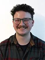 A portrait photograph of Dr David Hoey