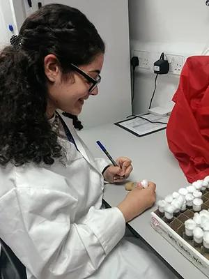 Photo of Kyriaki Neophytou in the lab