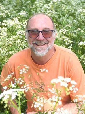 Graham Stone in field of flowers