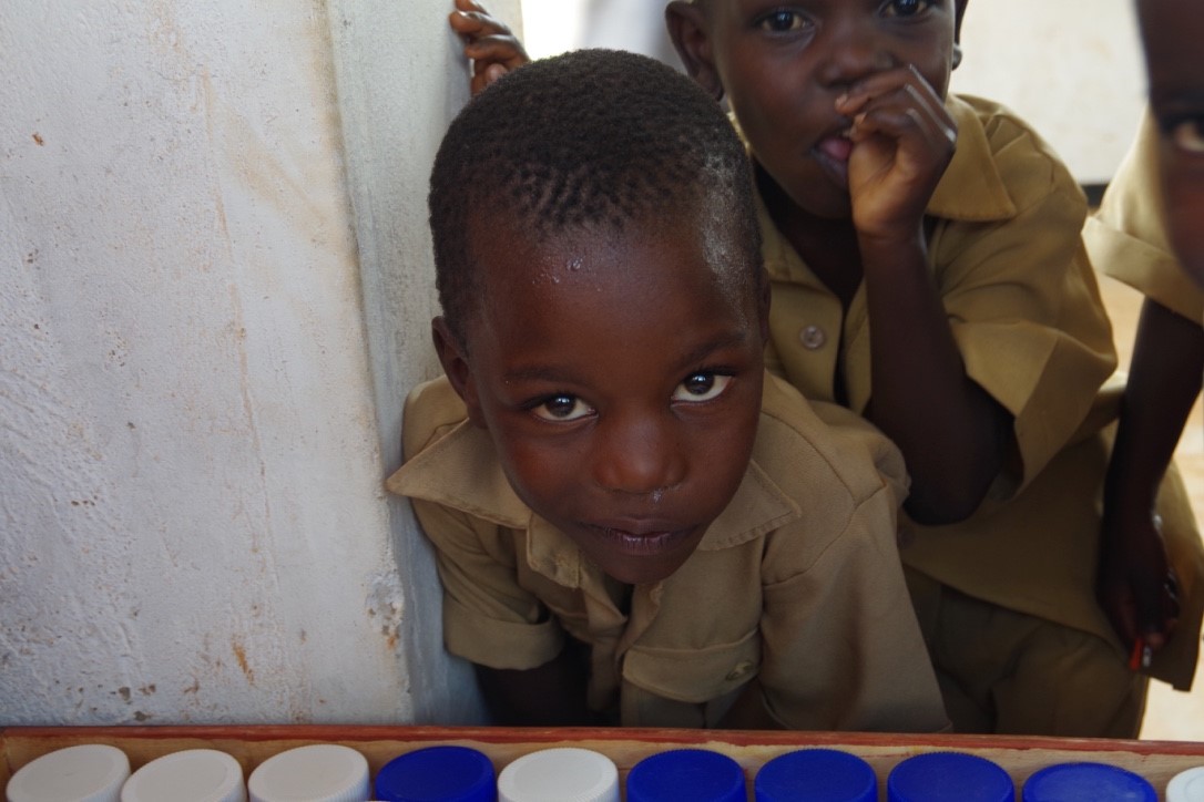 Photo of two young boys waiting to take part in the research