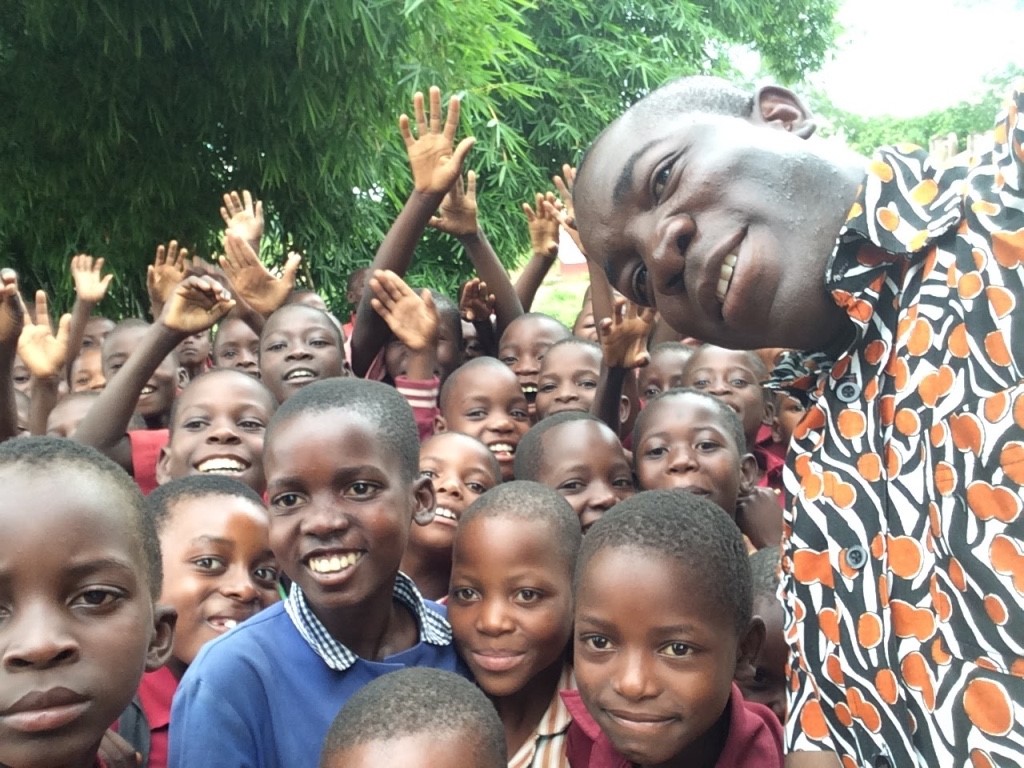 Photo of a group of schoolchildren with their teacher