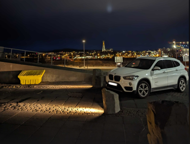 The Photo shows Reykjavík skyline from the deCODE building, with Hallgrimskirkja church in the background