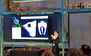 Photo of Dagmar der Weduwen presenting at the LiveScience exhibit