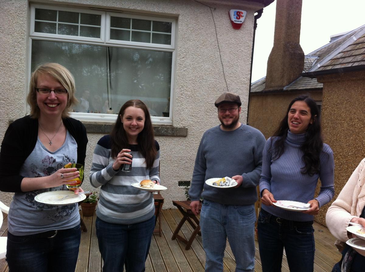 Photo of the lab group sitting with drinks 