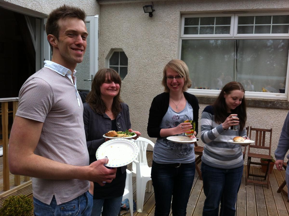 Photo of the lab group sitting with drinks 